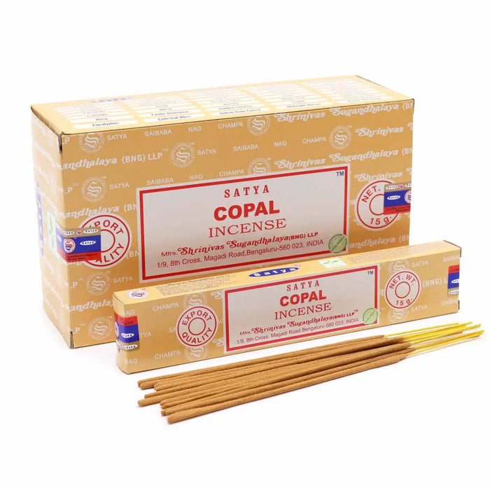 A box of satya incense sticks copal with beige and red packaging featuring the brand name prominently displayed