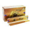 Satya incense sticks wrapped in gold foil inside a gold-colored box labeled gold incense for aromatic use