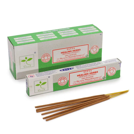 Satya incense sticks healing herbs in a green and white box with wooden sticks featuring white sage and patchouli scent