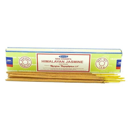 A box of satya incense sticks with light green and white packaging holding golden-brown satyn himalayan jasmine sticks