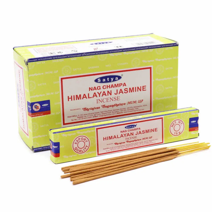 Bright yellow cardboard box of satya incense sticks with himalayan jasmine fragrance and natural ingredients