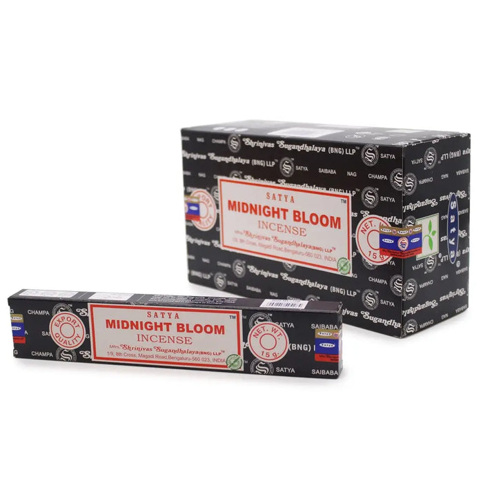 A black rectangular box of satya incense sticks with red and white labeling showing midnight blossom scent