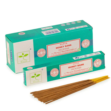Satya incense sticks in teal and white money bank packaging with slender brown cone incense sticks shown outside