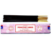 Pink rectangular box of satya incense sticks with dark brown wooden sticks and golden tips labeled positive vibes