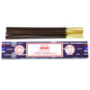 A box of satya incense sticks reiki with dark brown cylindrical sticks and purple packaging with red and white text
