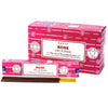 Pink cardboard box of satya incense sticks rose with white label featuring red and black text
