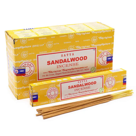 Yellow cardboard box of satya incense sticks with sandalwood scent for aromatic use