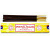 A box of satya incense sticks with dark brown wooden sticks and golden tips in bright yellow spiritual healing packaging