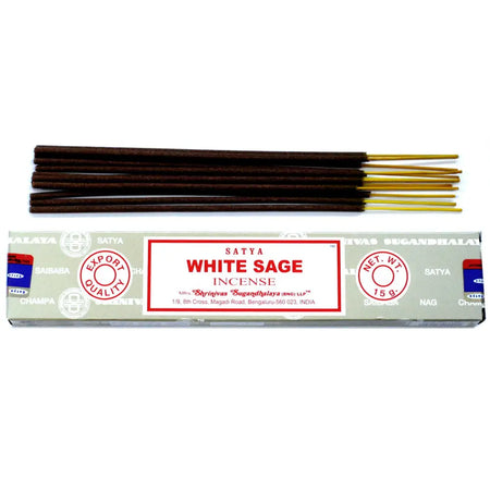 A box of satya incense sticks white sage with dark brown wooden sticks and golden tips in silver-gray packaging with red text