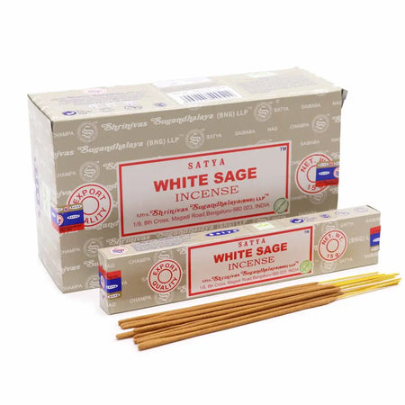 A box of satya incense sticks with white sage scent in beige packaging featuring red and black text and logos