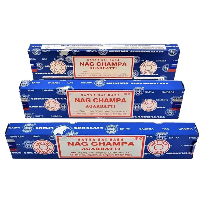 Blue rectangular boxes of satya nag champa champa incense sticks with red and white labels showing product details