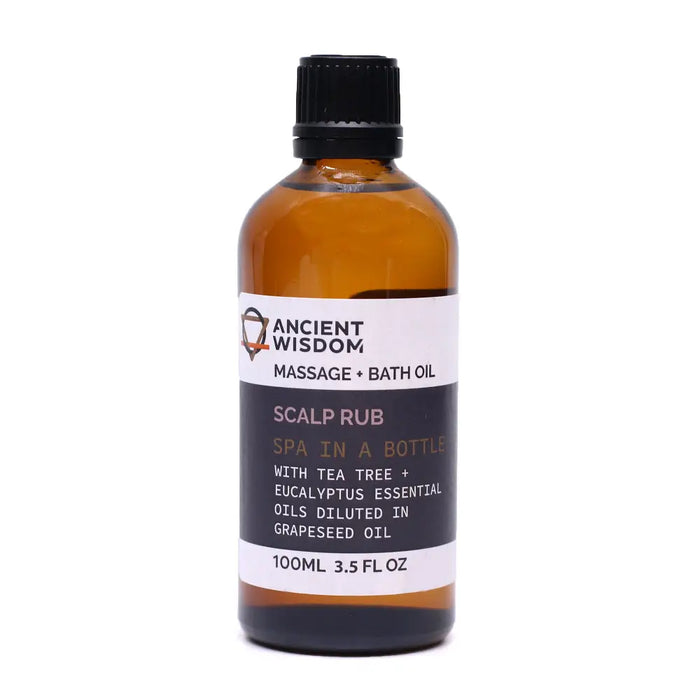 An amber glass bottle of scalp rub massage oil with tea tree and eucalyptus essential oils in grapeseed oil
