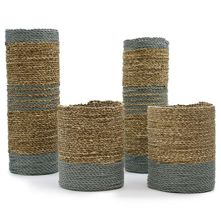 Set of four woven seagrass and abu-abu raffia vases and bins in natural beige and muted gray stripes cylindrical shape