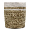 A beige cylindrical seagrass basket with two white rope bands shown as part of a set with vases and bins