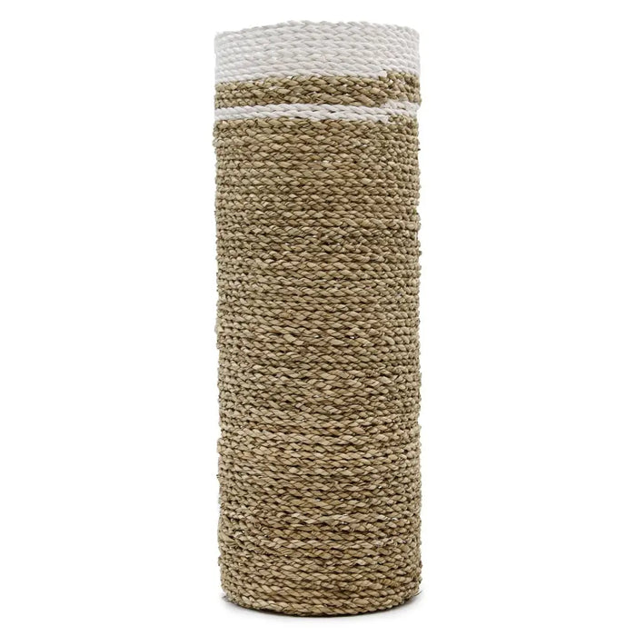 Natural fiber seagrass basket with woven texture and white trim, part of a set with vases and bins