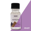 A clear glass bottle with black cap containing ancient wisdom sensual fragrance oil with floral notes and allergen declarations