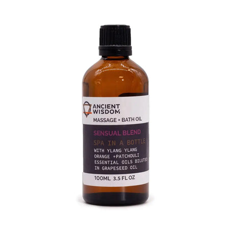 Brown glass bottle with black cap labeled ancient wisdom sensual massage oil with essential oils for massage use