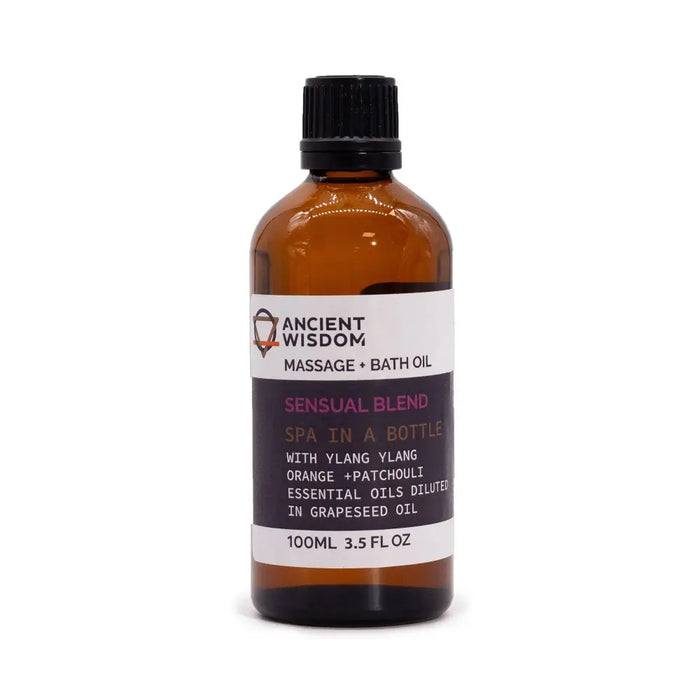 Brown glass bottle with black cap labeled ancient wisdom sensual massage oil with essential oils for massage use
