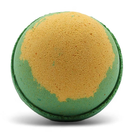 A round two-toned bath bomb with a textured green base and yellow top from the apple pie bath bombs set