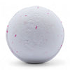 A white bath bomb with pink speckles from a set of 3 bath bombs coconut dream for a relaxing bath experience