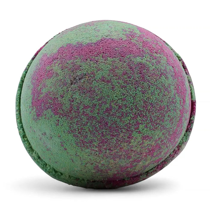 A round textured bath bomb with green and pink hues from the fruity rhubarb set of 3 bath bombs