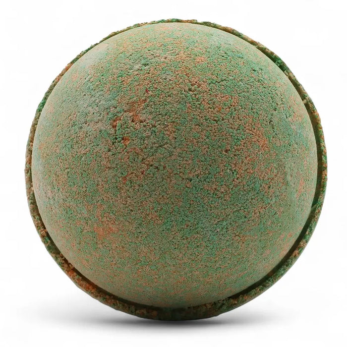A round textured bath bomb with green and rust colors from a set of 3 bath bombs hawaiian mango