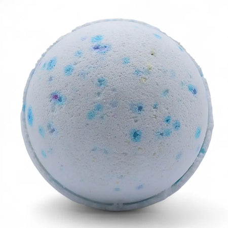 A spherical light blue bath bomb with darker blue speckles and purple flecks from a set of 3 ocean bath bombs