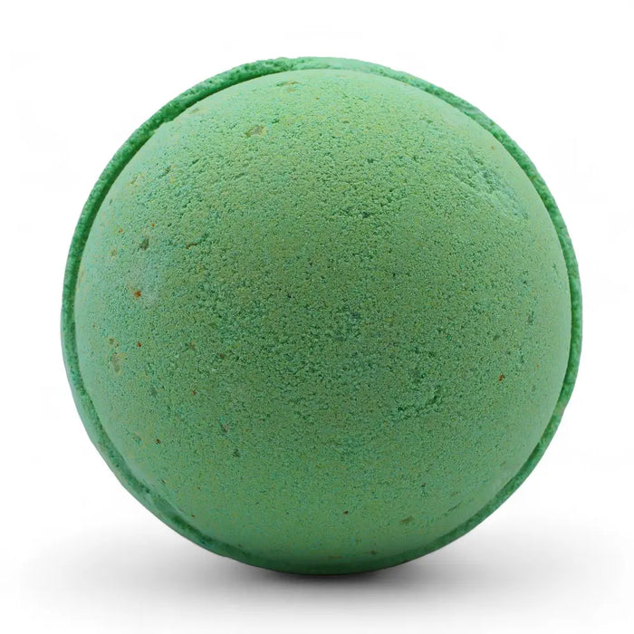A round green bath bomb with a textured surface and speckles from a set of 3 peppermint and tea tree bath bombs
