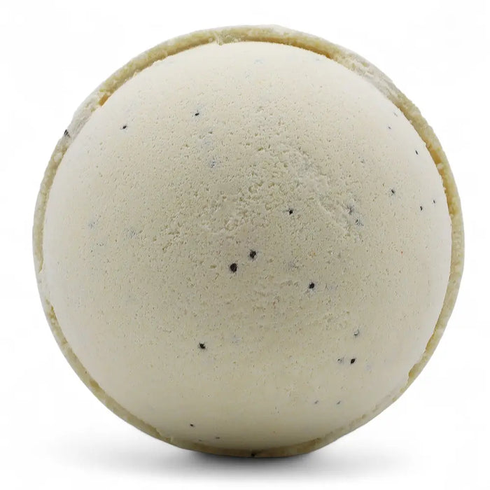 Cream-colored simply vanilla bath bomb with a textured surface and small black speckles in a set of 3 bath bombs
