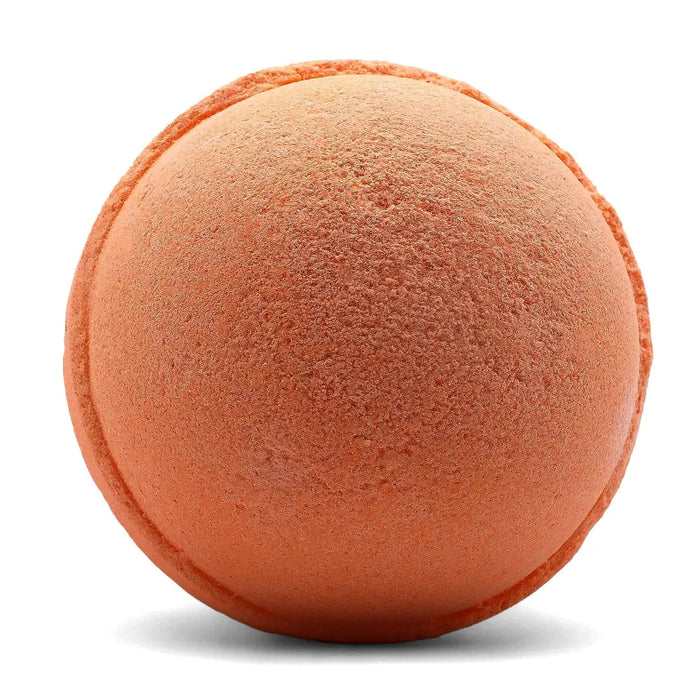 A round textured orange bath bomb with defined edges from a set of 3 bath bombs tangerine and grapefruit