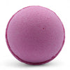 A round matte purple bath bomb with a textured surface from the set of 3 bath bombs very berry