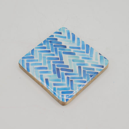Set of 4 square coasters with woven blue and white ceramic design for protecting surfaces from drinks