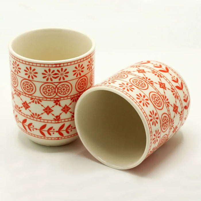 Set of 6 white ceramic herbal tea cups with intricate red floral and geometric patterns for small herbal teapot use