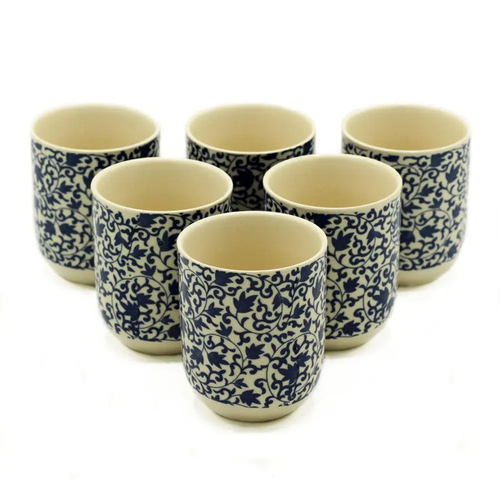 Set of 6 ceramic herbal tea cups with blue pattern floral design on cream base for small herbal tea serving