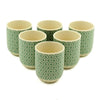 Set of six ceramic small herbal tea cups with green mosaic pattern on off-white base for herbal tea