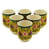 Set of six yellow ceramic herbal tea cups with red floral motifs and chinese characters long life oriental design