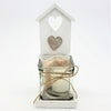 White wooden shabby chic beach hut tealight holder with heart cutout and glass jar candle with twine accent