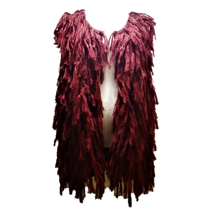 A deep burgundy fringed velvet vest with a textured layered design from the shaggy soft-knit acrylic sleeveless jacket three colours