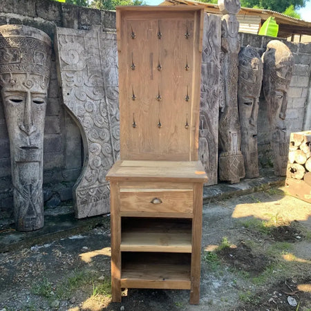 Light brown wooden shelf unit with hooks featuring a drawer and two shelves made from recycled wood