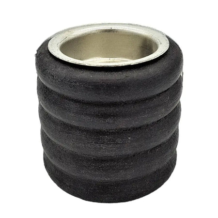 Black rubber grommet with metallic silver ring on a short ribbed wooden tealight holder for candle use