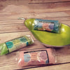 Lime green pear-shaped ceramic bowl with metallic rim holding simmering granules for mango flavor use