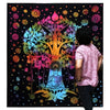Single cotton bedspread with a rainbow tree of life and meditating buddha on black background with floral patterns