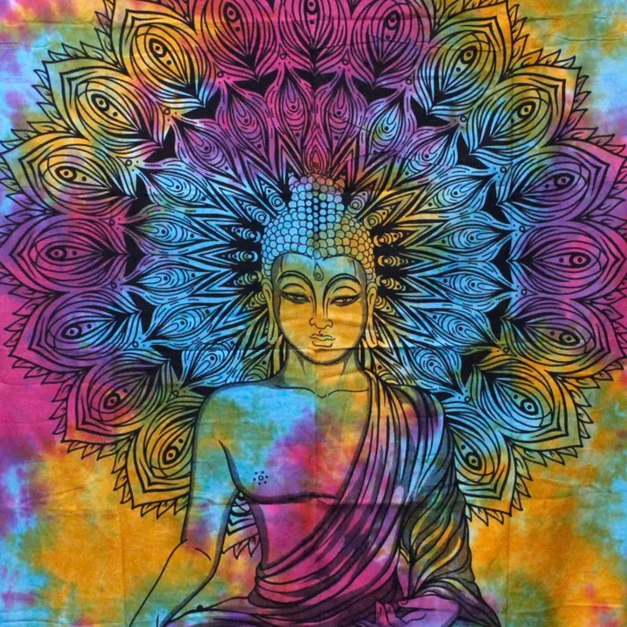 A vibrant cotton bedspread wall hanging with a meditative buddha and rainbow peacock feather design