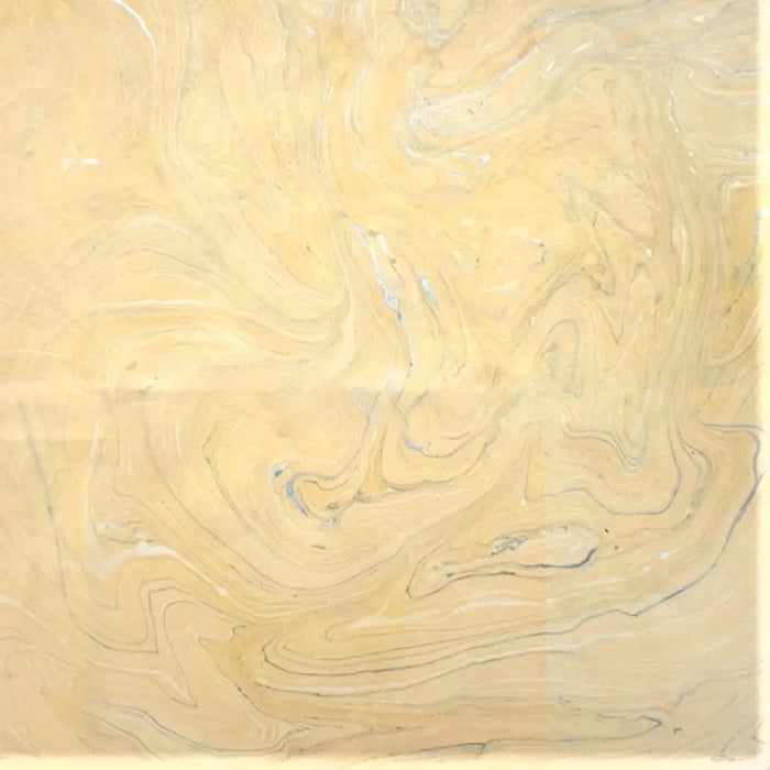 Beige marble single sheet handmade marbled gift wrap with swirling gray and white veining and green gold tones