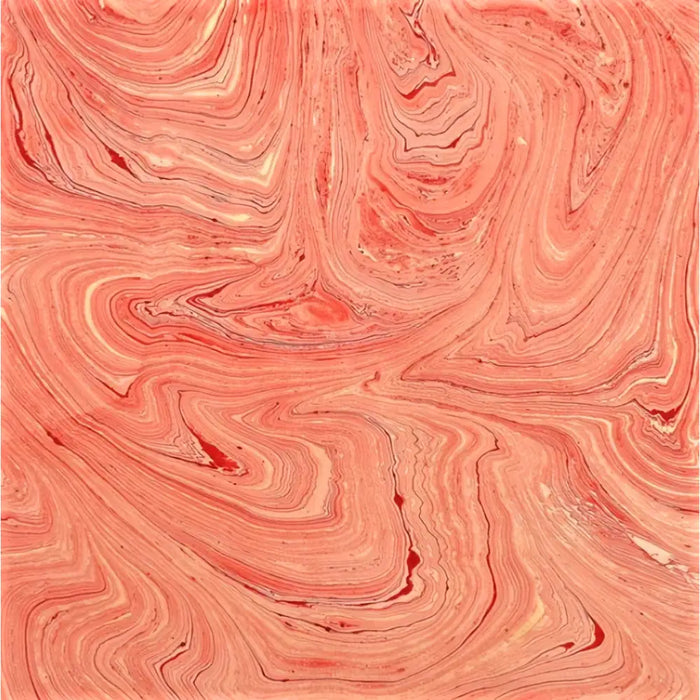 Single sheet handmade marbled gift wrap with vibrant coral cream swirls and hints of green gold colors