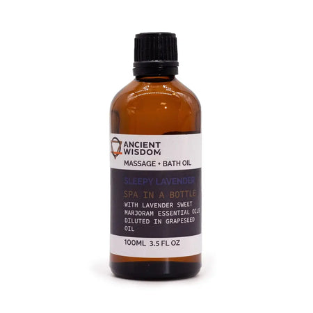 An amber glass bottle with black cap containing sleepy lavender massage oil from ancient wisdom for bath and massage use