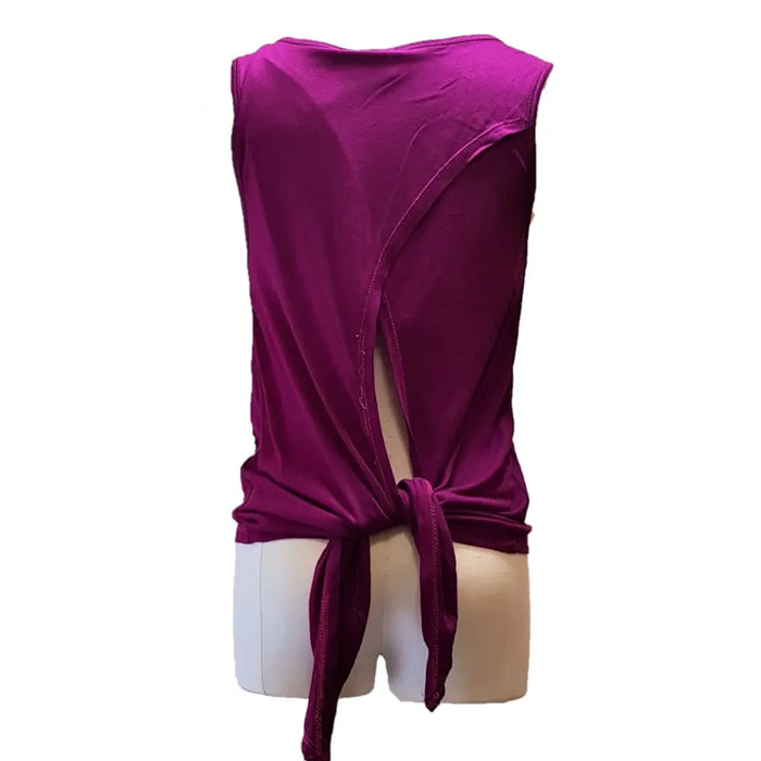 A vibrant magenta sleeveless top with back tie detail and embellished elephant print made from smooth stretch fabric
