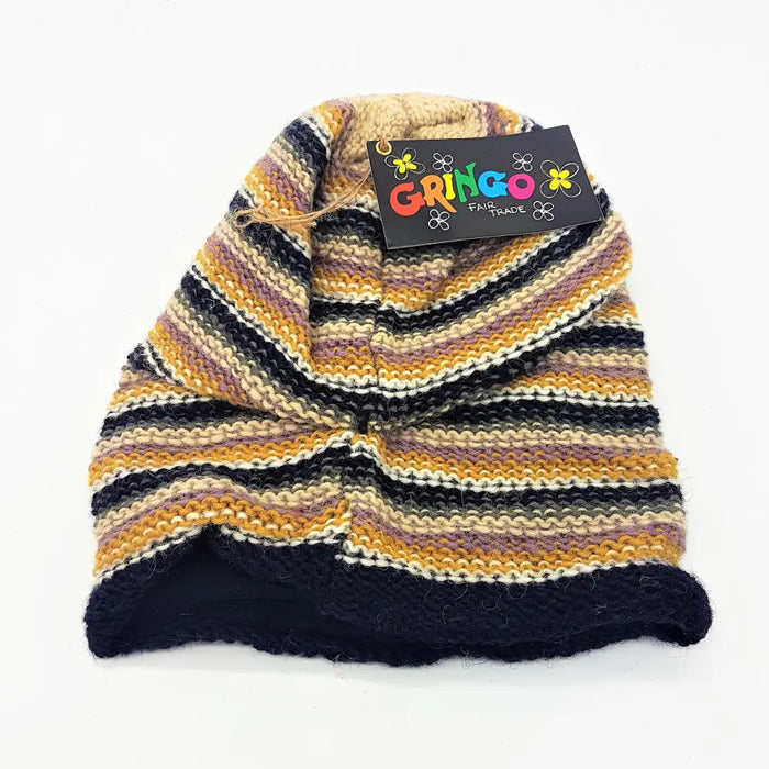 Slouchy wool beanie hat in colorful stripes of mustard yellow black beige and purple knit for adults
