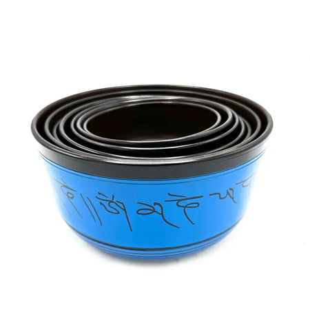 Small chakra blue plastic bowl with black rim and tibetan script from seven singing bowls set 14 to 22 cm