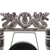 Small healing gong on black stand with rustic wooden dragon design and weathered gray finish suspended by black cords